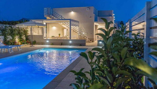 Villa Blue Oasis in Sicily – A stunning luxury villa with a private pool, modern design, and elegant outdoor spaces, perfect for a relaxing getaway.
